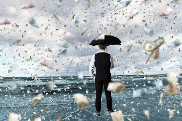 stock image Money rain and businessman with umbrella