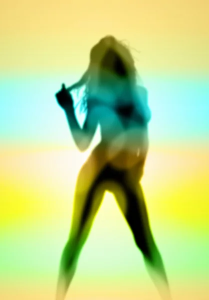 Renkli arka plan karşı kadın silueti — Stok fotoğraf