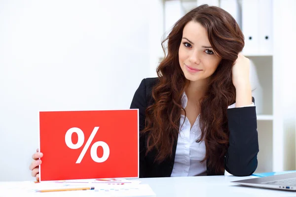 Young business woman with sale sign — Stock Photo, Image