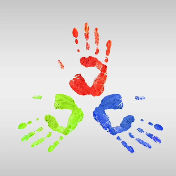 Impressões coloridas de mãos humanas — Fotografia de Stock