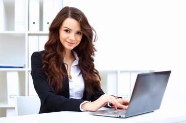 Young busines woman with notebook clipart