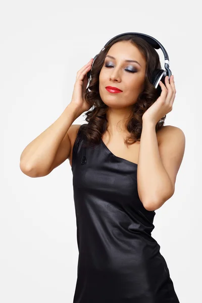 Portrait of young woman with headphones Stock Picture