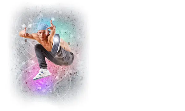 Молодой человек танцует хип-хоп с цветовыми линиями — стоковое фото