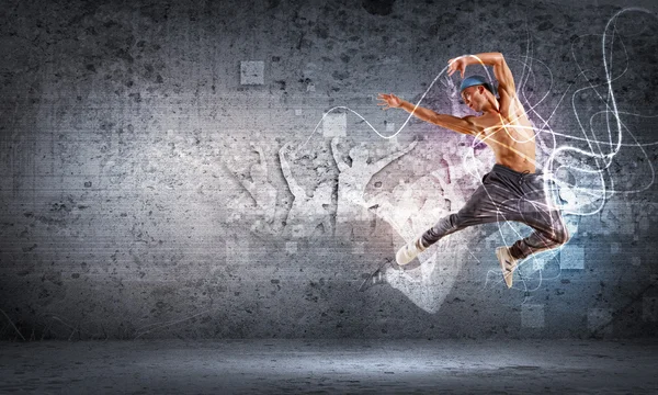 Mladý muž taneční hip hopu s barevné linky — Stock fotografie