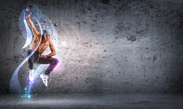 Young man dancing hip hop with color lines — Stock Photo, Image