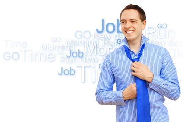 Giovane uomo d'affari legando la sua cravatta blu — Foto Stock