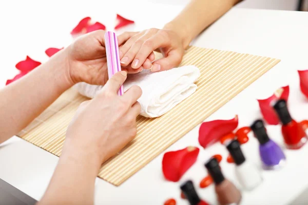 stock image Woman is getting manicure