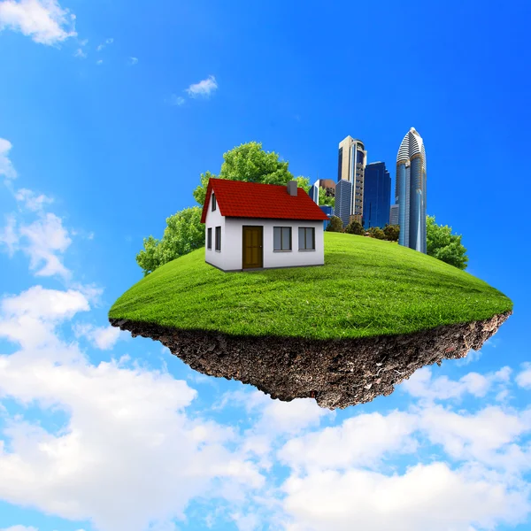 一块土地用房子和树在空中. — 图库照片