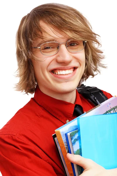 Glücklicher Student mit Büchern — Stockfoto