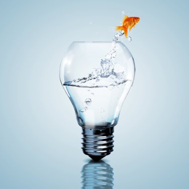Gold fish inside an electric bulb clipart