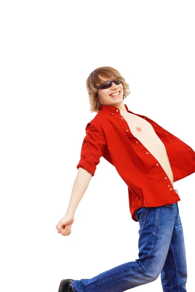 Glücklich lächelnder junger Mann tanzt lizenzfreie Stockfotos