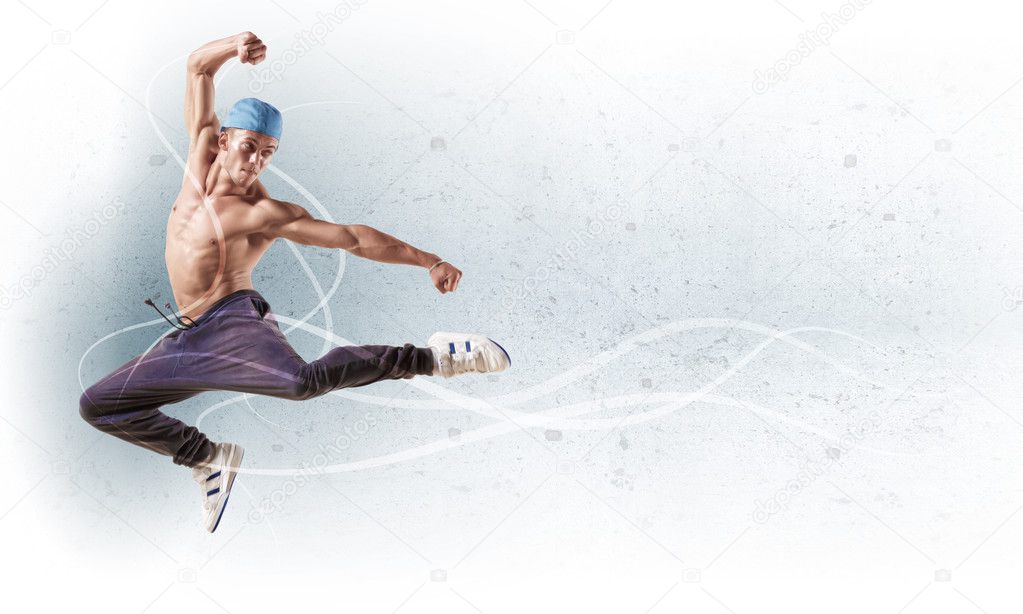 Young man dancing hip hop with color lines