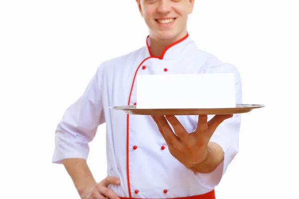 Cozinheiro segurando uma bandeja vazia — Fotografia de Stock