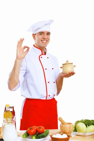 Jonge kok bereiden van voedsel — Stockfoto