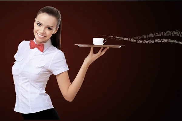 Waitress with a cup of coffee — Stock Photo, Image