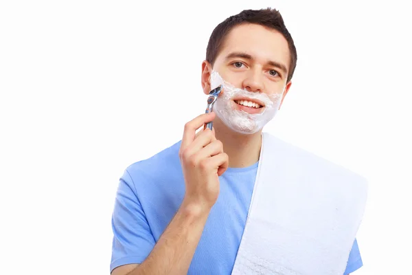 Young man at home shaving himself — Stock Photo, Image