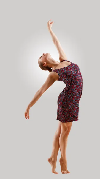 Girl in color dress dancing — Stock Photo, Image