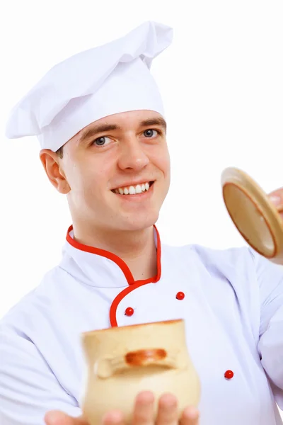 Jeune cuisinier préparer des aliments — Photo