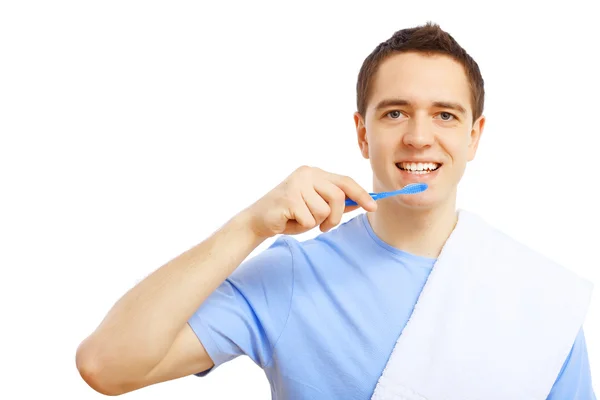 Junger Mann mit Zahnbürste — Stockfoto