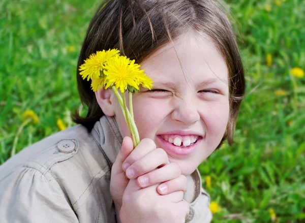 Girl with dandelions. — Stock Photo, Image