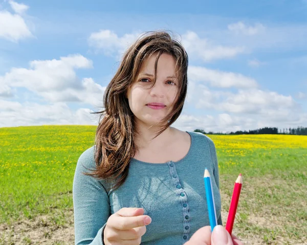 Woman and pencils. — Stock Photo, Image