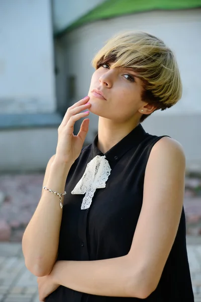 stock image Beautiful girl standing in the street