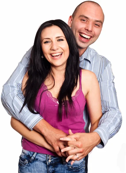 Vértes portréja mosolygó fiatal pár a szerelem — Stock Fotó