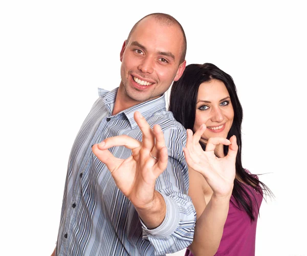 Mann und Frau lächeln und zeigen Ihnen ok Zeichen — Stockfoto