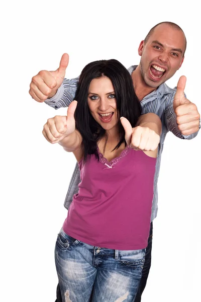 Два молодых улыбающихся с большим пальцем вверх жеста изолированы на Уит — стоковое фото