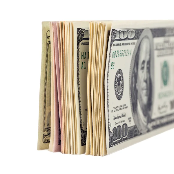 Billetes en dólares estadounidenses sobre fondo blanco — Foto de Stock