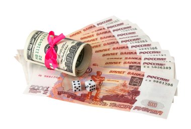 Two dice laying over a pile of money clipart