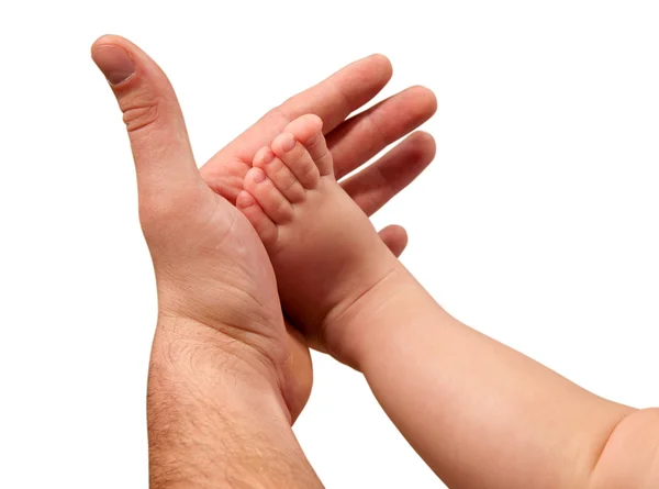 Руки батька і дитини — стокове фото