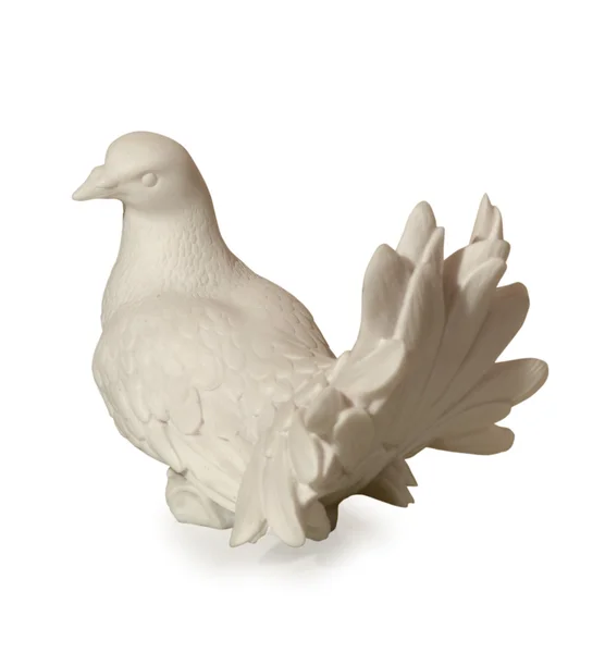 Klein standbeeld van een duif — Stockfoto