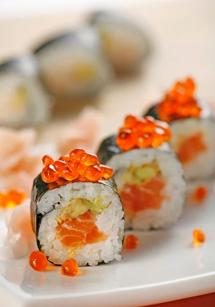 Sushi with salmon and red caviar — Stock Photo, Image