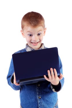 Red little boy with surprise looks in the laptop clipart