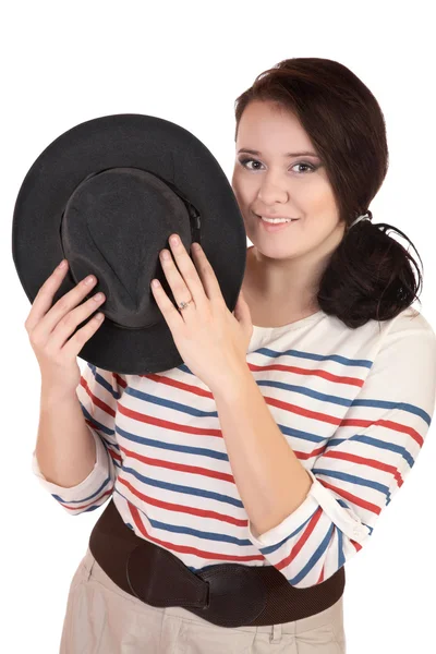 De lachende mollig meisje met een hoed — Stockfoto