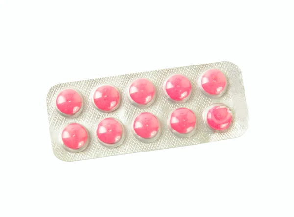 Paket mit rosa Tabletten — Stockfoto
