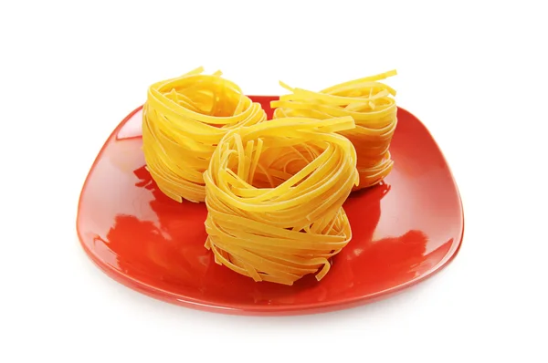Pasta nesten op een schotel — Stockfoto