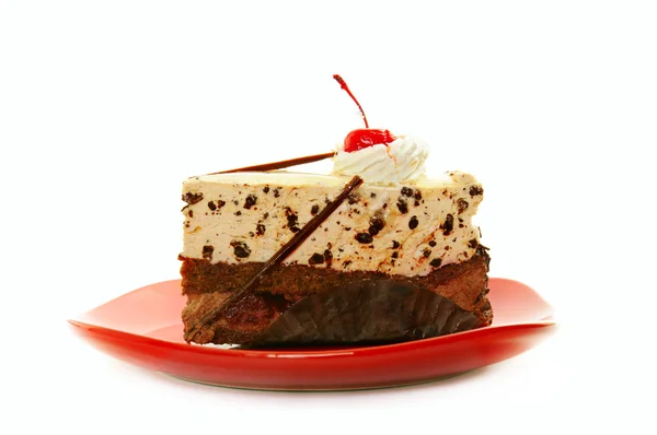 stock image Chocolate cake on red dish