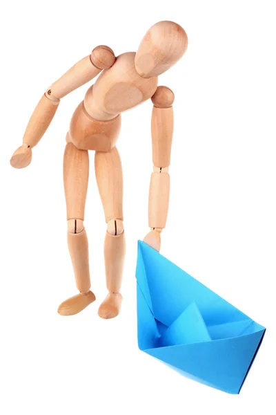 Dummy and paper ship — Stock Photo, Image