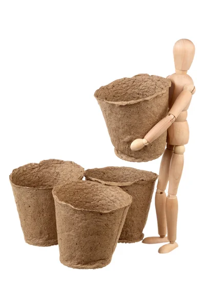 Dummy with peat pots — Stock Photo, Image