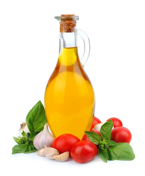 Oil bottle with vegetables — Stock Photo, Image
