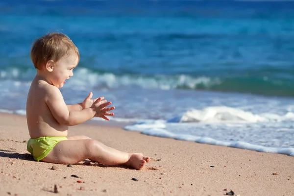 Happy toddler on sand beach — Stock Photo, Image