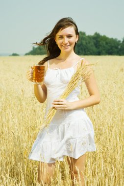 Girl with beer and wheat ear clipart