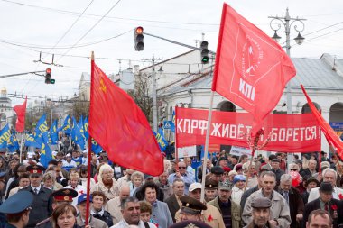 Workers and opposition group walks in main street clipart