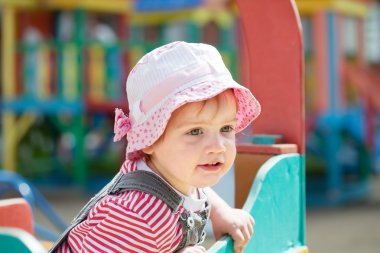 Two-year child at playground clipart