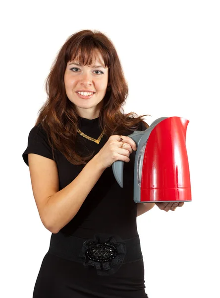 Жінка з електричним чайником — стокове фото