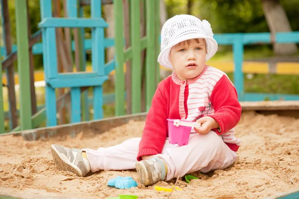 Two-year child in sandbox — Stock Photo, Image