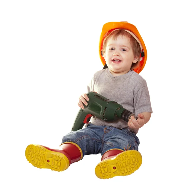 Toddler in hardhat with drill. Isolated over white — Stock Photo, Image