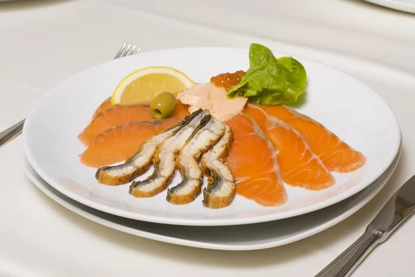Fish platter with salmon caviar — Stock Photo, Image
